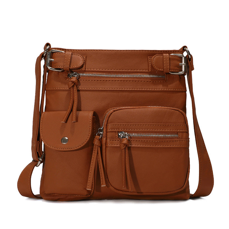 Mjuk crossbody-väska med flera fickor