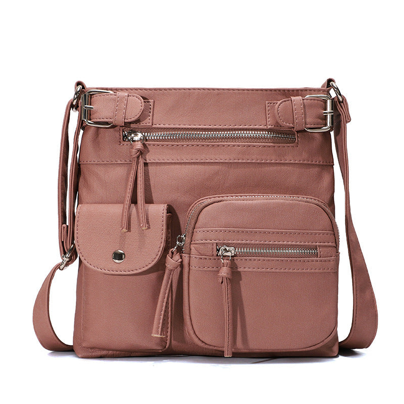 Mjuk crossbody-väska med flera fickor