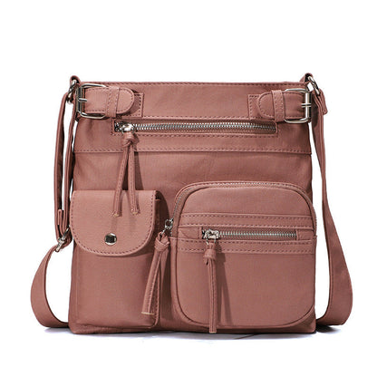 Mjuk crossbody-väska med flera fickor