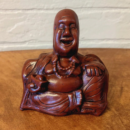 Dekoration med Buddha och utsträckt långfinger