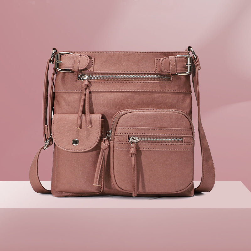 Mjuk crossbody-väska med flera fickor