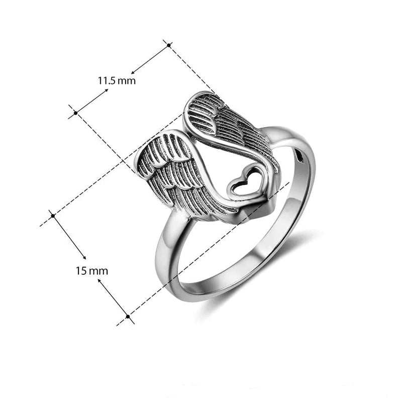 Ring med ängelvingar och hjärtdesign